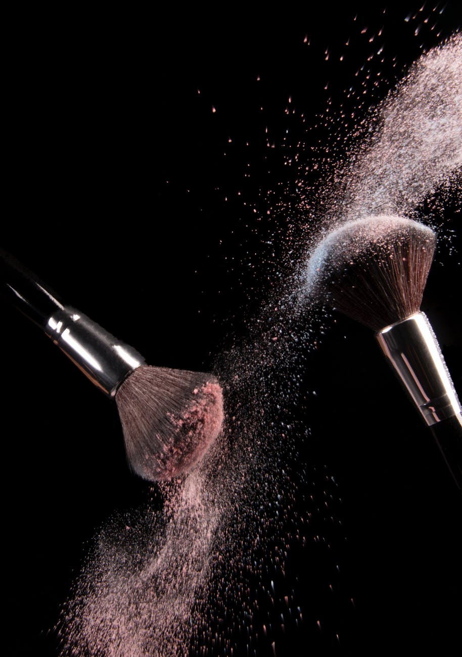 cosmetics makeup brushes and powder dust explosion